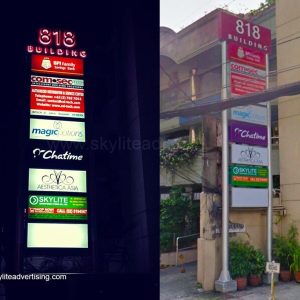 Pylon Sign with Top Building Signage and Panaflex Lightboxes