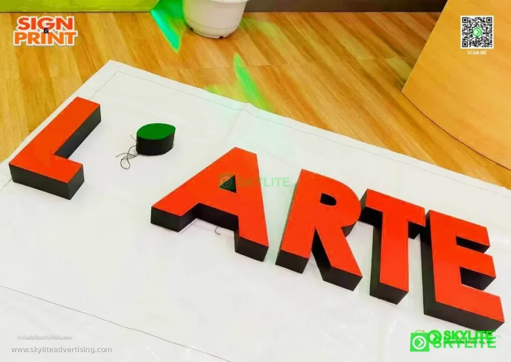 L Arte Lighted Acrylic Signage Installed in Sta